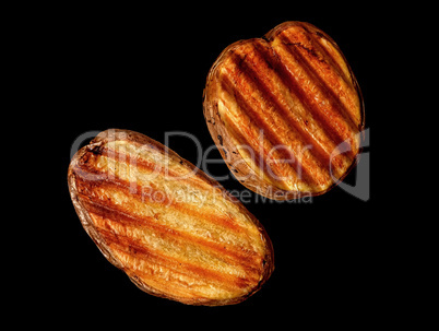 Two slices of grilled potatoes rotated