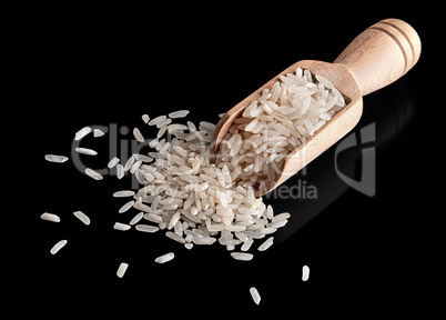 White rice in wooden scoop
