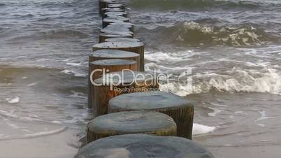 Wavebreakers Surrounded by Tidal Waves