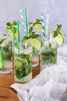 Refreshing tonic with slices of cucumber, mint, lime