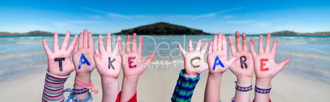 Children Hands Building Word Take Care, Ocean Background
