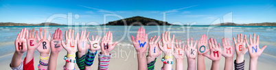 Children Hands Building Word Herzlich Willkommen Means Welcome, Ocean Background