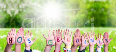Children Hands Building Word Hos Geldiniz Means Welcome, Grass Meadow