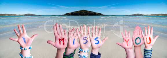 Children Hands Building Word I Miss You, Ocean Background