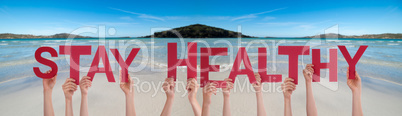 People Hands Holding Word Stay Healthy, Ocean Background
