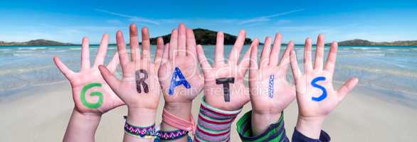 Children Hands Building Word Gratis Means Free, Ocean Background