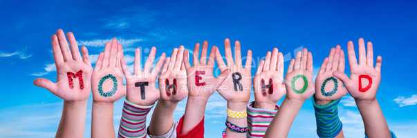 Children Hands Building Word Motherhood, Blue Sky