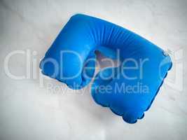 Blue inflatable pillow for comfortable neck position
