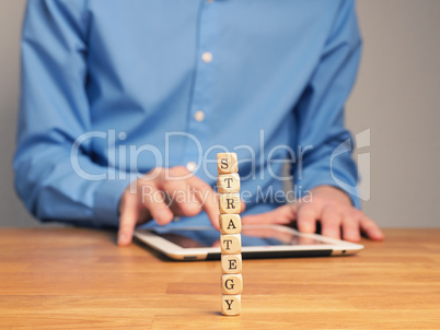 Concepual business image with small wooden blocks