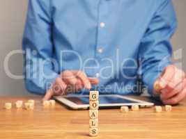 Goals, concepual business image with small wooden blocks