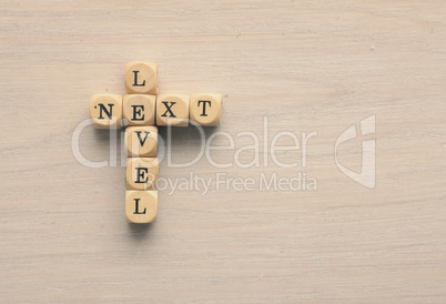 Next level on small wooden blocks