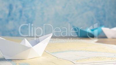 Paper boat on an office table