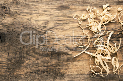 Rustic wood with wood shavings and space for text
