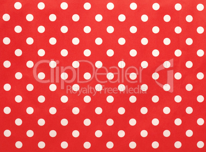Paper texture with white dots on red using as background