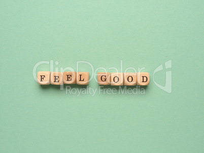 Feel good written with small wooden block