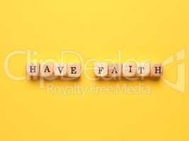 Have faith written with small wooden blocks