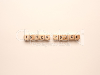Inner peace written with small wooden blocks