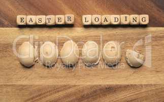 Wooden cubes with the inscription Easter loading, sweet Easter e
