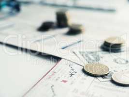 Financial concept with currency and financial news paper