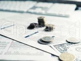 Financial concept with currency and financial news paper