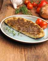 Tasty manaqish with thyme and sesame