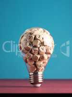A lot of alphabetically labeled wooden cubes in a light bulb