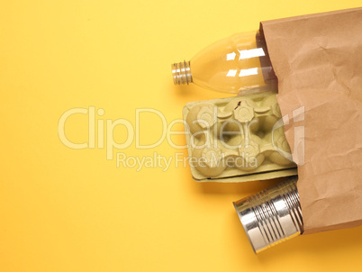 Paper bag with recyclable consumer goods