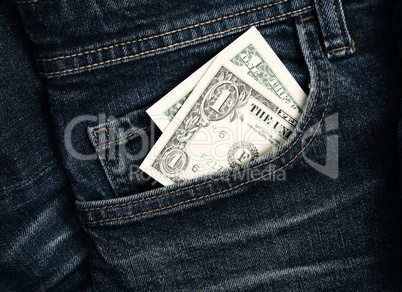 One dollar banknote in a jeans pocket