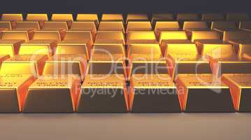 Stacked gold bars on a dark background