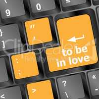 Modern keyboard key with words to be in love