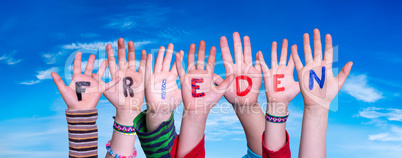 Children Hands Building Word Frieden Means Peace, Blue Sky