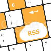 RSS button on keyboard key close-up, business concept