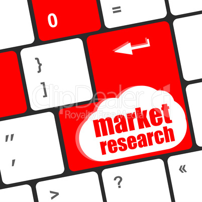 key with market research text on laptop keyboard, business concept