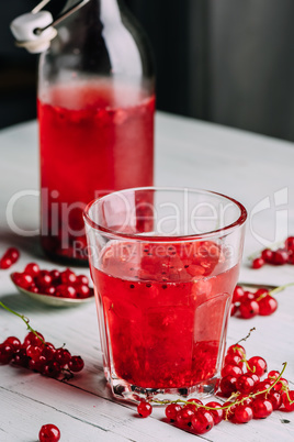 Glass of infused water with red currant