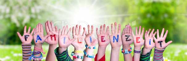 Children Hands Building Word Familienzeit Means Familytime, Grass Meadow