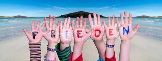 Children Hands Building Word Frieden Means Peace, Ocean Background