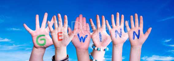 Children Hands Building Word Gewinn Means Prize, Blue Sky