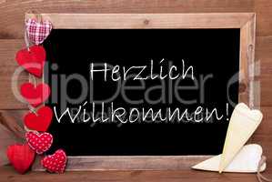 Balckboard With Heart Decoration, Text Herzlich Willkommen Means Welcome