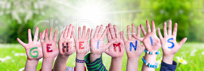 Children Hands Building Word Geheimnis Means Secret, Grass Meadow