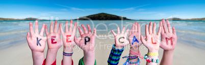 Kids Hands Holding Word Keep Calm, Ocean Background
