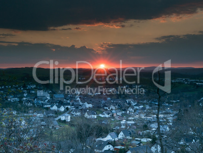 Sunrise with with clouds over the german city called Hallenberg