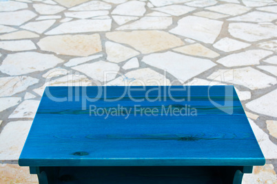 Empty turquoise wooden table