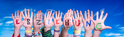 Children Hands Building Word Erziehung Means Education, Blue Sky