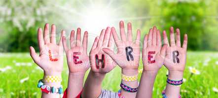 Children Hands Building Word Lehrer Means Teacher, Grass Meadow
