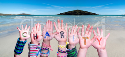 Children Hands Building Word Charity, Ocean Background