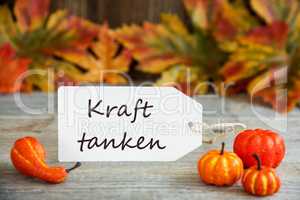 Label With Text Kraft Tanken Means Relax, Pumpkin And Leaves