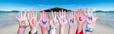 Children Hands Building Word Gewinnen Means Win, Ocean Background