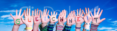 Children Hands Building Word Gleichheit Means Equality, Blue Sky