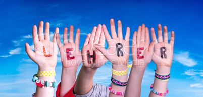 Children Hands Building Word Lehrer Means Teacher, Blue Sky