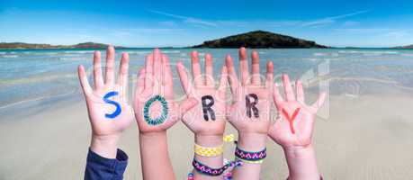 Children Hands Building Word Sorry, Ocean Background